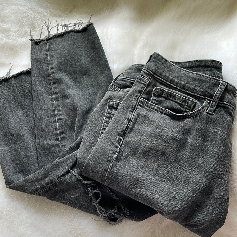 Acid washed black distressed jeans